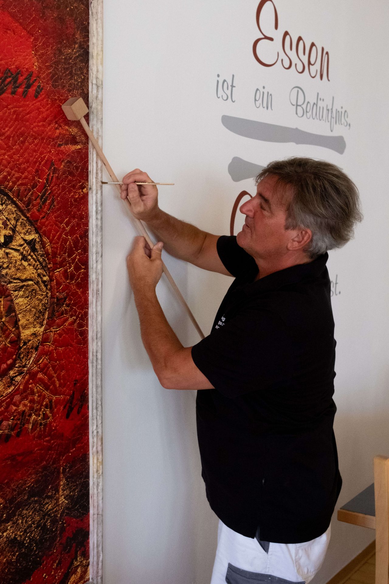 Maler beim Ausbessern